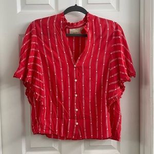 Salmon colored button down blouse